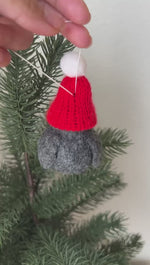 Load and play video in Gallery viewer, Hand Felted Penguin Christmas Decoration | Christmas Penguin Ornament | Penguin with red hat| Hanging Tree Ornament 100% Wool| Cute Penguin
